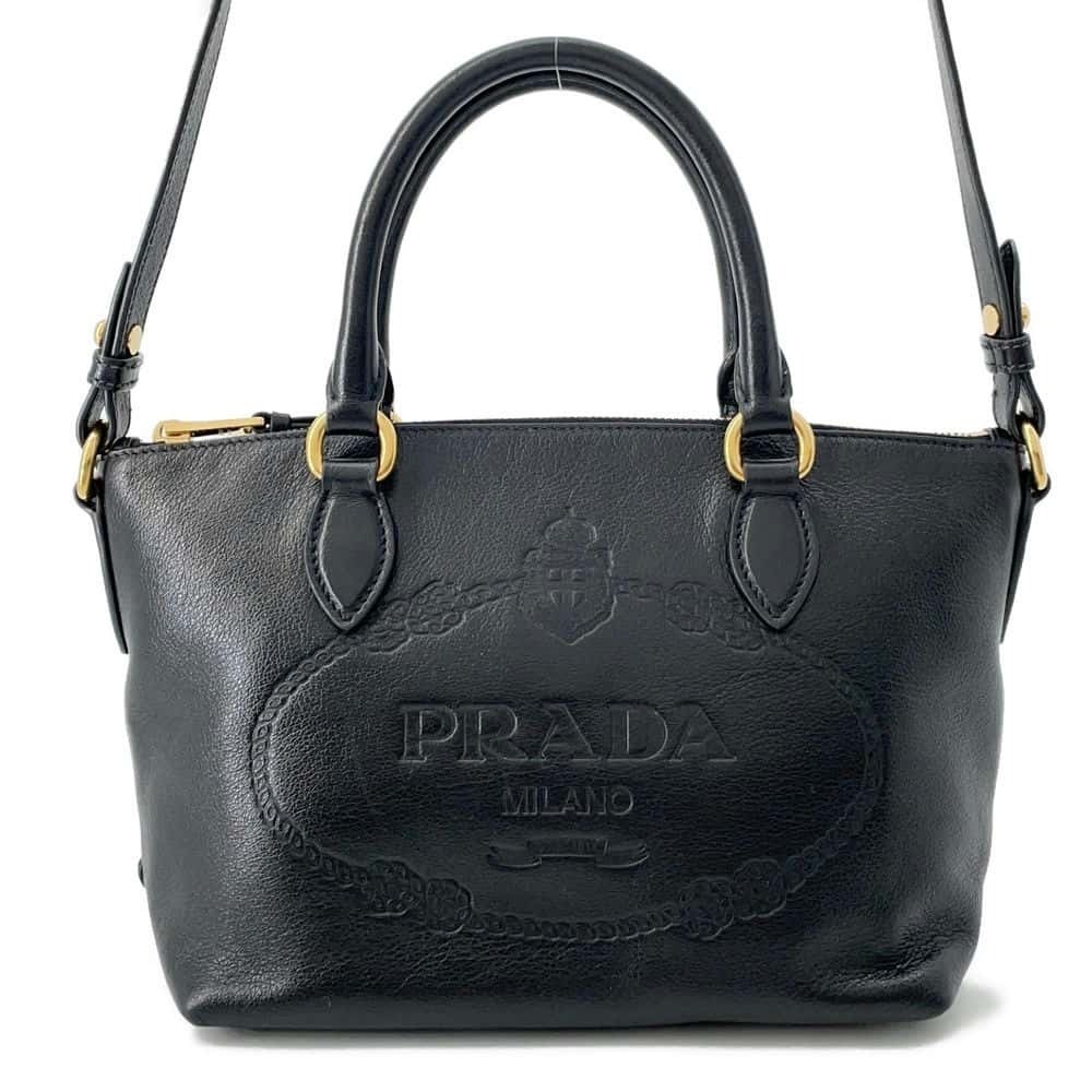 Prada handbag embossed logo leather black bag